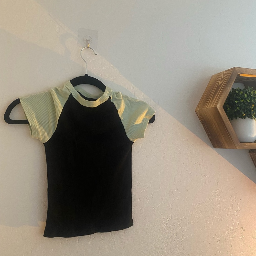 green and black baby tee